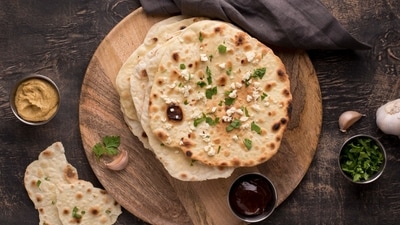 Dr Shubham Vatsya says choose rotis wisely — jowar or bajra for diabetes, ragi for bones, besan for protein, oats for heart — instead of quitting them. (Freepik) Dr Shubham Vatsya says choose rotis wisely — jowar or bajra for diabetes, ragi for bones, besan for protein, oats for heart — instead of quitting them. (Freepik)