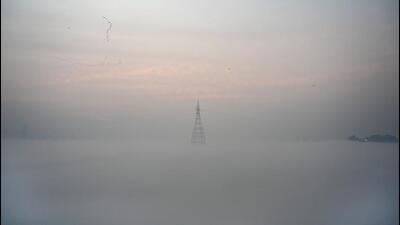A view of the Yamuna River covered in fog early on Friday. (Sunil Ghosh/HT PHOTO) A view of the Yamuna River covered in fog early on Friday. (Sunil Ghosh/HT PHOTO)