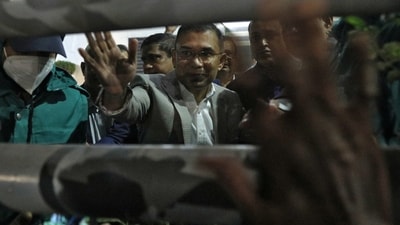 Bangladesh Nationalist Party (BNP) acting chairman Tarique Rahman waves as he arrives at Evercare Hospital to meet his ailing mother and former Prime Minister Khaleda Zia, in Dhaka, Bangladesh. (REUTERS)