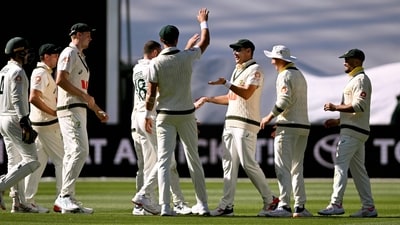 Australia's Scott Boland is congratulated by teammates after taking a catch to dismiss England batsman Brydon Carse. (AFP) Australia's Scott Boland is congratulated by teammates after taking a catch to dismiss England batsman Brydon Carse. (AFP)