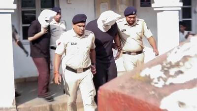 Saurabh and Gaurav Luthra taken from the Mapusa court after their police remand was extended by four days on Friday. (ANI Video Grab) Saurabh and Gaurav Luthra taken from the Mapusa court after their police remand was extended by four days on Friday. (ANI Video Grab)