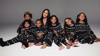 Kim Kardashian shared festive photos featuring her kids, nieces, and nephews in matching pajamas (Kim Kardashian/ Instagram) Kim Kardashian shared festive photos featuring her kids, nieces, and nephews in matching pajamas (Kim Kardashian/ Instagram)
