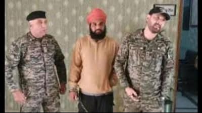 Sharandeep Singh in the custody of Pakistan’s security forces. Sharandeep Singh in the custody of Pakistan’s security forces.