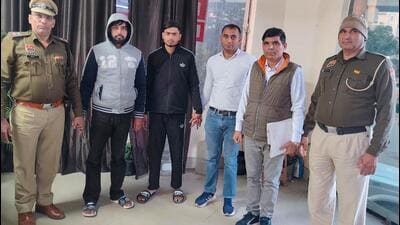 The accused, Tushar (in hoodie), and his aide, Shubham, in police custody on Friday. (HT Photo) The accused, Tushar (in hoodie), and his aide, Shubham, in police custody on Friday. (HT Photo)
