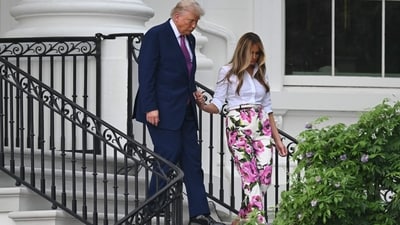 US President Donald Trump (L) and US First Lady Melania Trump arrive to attend the Congressional Picnic on the South Lawn of the White House in Washington, DC, on June 12, 2025. (AFP) US President Donald Trump (L) and US First Lady Melania Trump arrive to attend the Congressional Picnic on the South Lawn of the White House in Washington, DC, on June 12, 2025. (AFP)