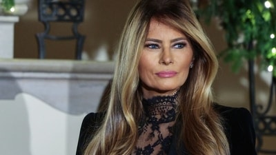 US President Donald Trump, left, and First Lady Melania Trump during the Congressional Ball in the Grand Foyer of the White House in Washington, DC, US, on Thursday, Dec. 11, 2025. (Bloomberg) US President Donald Trump, left, and First Lady Melania Trump during the Congressional Ball in the Grand Foyer of the White House in Washington, DC, US, on Thursday, Dec. 11, 2025. (Bloomberg)