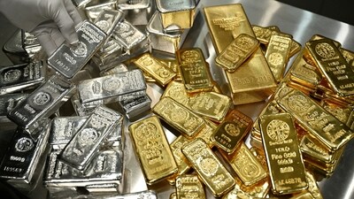 Gold and silver bars are stacked in the safe deposit boxes room of the Pro Aurum gold house in Munich, Germany. (Reuters)