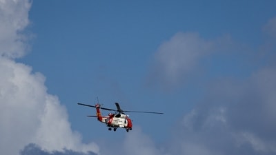 A U.S. Coast Guard helicopter flying over Puerto Rico last week. A U.S. Coast Guard helicopter flying over Puerto Rico last week.