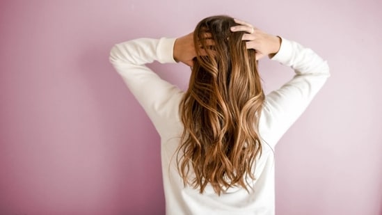 Hair oil should be applied for only 30 minutes and completely washed off afterwards, according to Dr Reddy. (Unsplash)