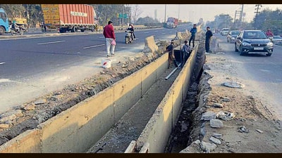 Damaged sewerage cover on Jalandhar Bypass Road in Ludhiana on Saturday. (Gurpreet Singh/HT) Damaged sewerage cover on Jalandhar Bypass Road in Ludhiana on Saturday. (Gurpreet Singh/HT)