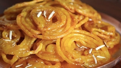 Whether it’s sweet like jalebi or savoury like kathi rolls, you can enjoy every bite as you embark on snack tourism. (Picture credit: Freepik) Whether it’s sweet like jalebi or savoury like kathi rolls, you can enjoy every bite as you embark on snack tourism. (Picture credit: Freepik)