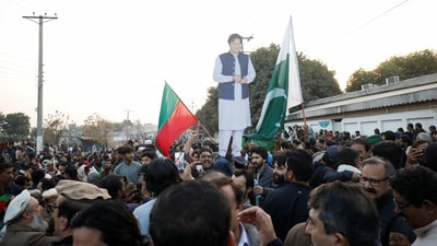 Supporters hold a cutout of former Prime Minister of Pakistan and Leader of Pakistan Tehreek-e-Insaf (PTI) party Imran Khan. (REUTERS/File Photo)