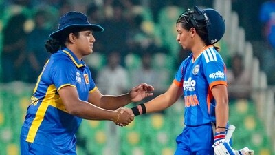 India's captain Harmanpreet Kaur, right, being congratulated by her Sri Lankan counterpart Chamari Athapaththu. (PTI) India's captain Harmanpreet Kaur, right, being congratulated by her Sri Lankan counterpart Chamari Athapaththu. (PTI)