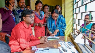 People gather at a centre during hearings under the Special Intensive Revision (SIR) of the electoral rolls, in Nadia, West Bengal, on December 27. (PTI)