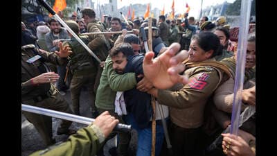 Protesters scuffle with police in Jammu on Saturday. (AP)