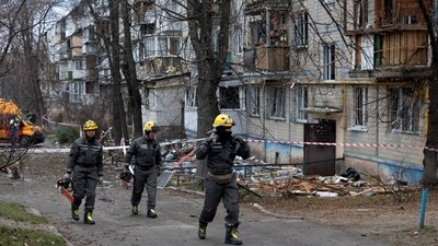Emergency responders leave the site of an apartment building that was hit by a Russian drone, amid Russia's attack on Ukraine. (REUTERS/File Photo)