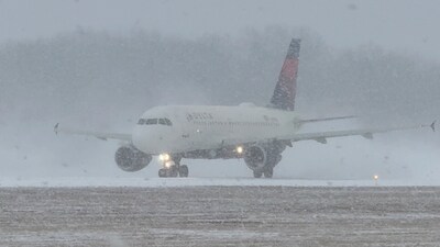 A Delta Air Lines plane prepares to take off during a winter storm at Greater Rochester International Airport in Rochester, New York, U.S. (Joseph Frascati via REUTERS)
