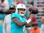 Miami Dolphins quarterback Tua Tagovailoa (1) warms up before an NFL football game against the Tampa Bay Buccaneers Sunday, Dec. 28, 2025, in Miami Gardens, Florida. Miami Dolphins quarterback Tua Tagovailoa (1) warms up before an NFL football game against the Tampa Bay Buccaneers Sunday, Dec. 28, 2025, in Miami Gardens, Florida.
