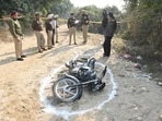 Police officials near Bilron village in Garhshankar where the accused were nabbed on Saturday. (HT photo) Police officials near Bilron village in Garhshankar where the accused were nabbed on Saturday. (HT photo)