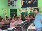 Students at a government-run primary school in Prayagraj. (HT file)
