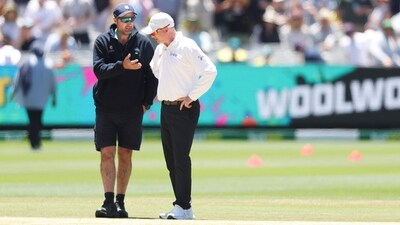 MCG Head Curator Matt Page speaks to a match official during the second day of the fourth Ashes Test. (AFP) MCG Head Curator Matt Page speaks to a match official during the second day of the fourth Ashes Test. (AFP)