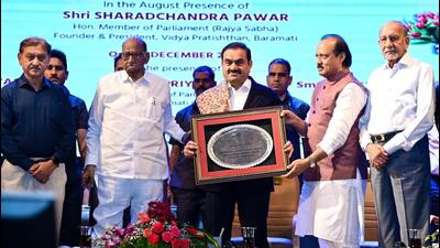 Industrialist Gautam Adani (centre) with Sharad Pawar (to his right) and Ajit Pawar (to his left) in Baramati on Sunday. (HT Photo) Industrialist Gautam Adani (centre) with Sharad Pawar (to his right) and Ajit Pawar (to his left) in Baramati on Sunday. (HT Photo)