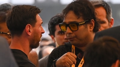 Organiser Satadru Dutta (R) with Argentina football star Lionel Messi has been detained over chaos at the Salt Lake Stadium during Messi's India Tour in Kolkata, India, on Saturday, December 13, 2025. (Hindustan Times) Organiser Satadru Dutta (R) with Argentina football star Lionel Messi has been detained over chaos at the Salt Lake Stadium during Messi's India Tour in Kolkata, India, on Saturday, December 13, 2025. (Hindustan Times)