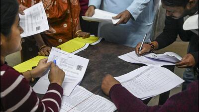 People attend a hearing on the Special Intensive Revision of electoral rolls in Kolkata on Sunday. (PTI) People attend a hearing on the Special Intensive Revision of electoral rolls in Kolkata on Sunday. (PTI)