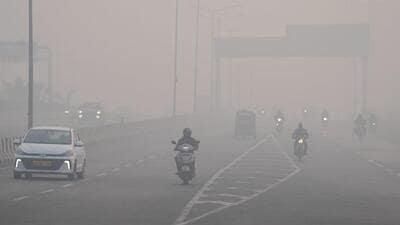 People commute amid dense smog and poor visibility in New Delhi on Sunday. (PTI) People commute amid dense smog and poor visibility in New Delhi on Sunday. (PTI)