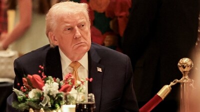 Donald Trump takes part in a Christmas Eve dinner in the ballroom of his Mar-a-Lago club in Palm Beach, Florida, US (REUTERS)