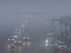  Vehicles move slowly through dense fog on Delhi meerut Expressway as low visibility. 