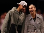 Aryna Sabalenka and Nick Kyrgios laugh ahead of their Battle of the Sexes tennis match in Dubai, United Arab Emirates. 