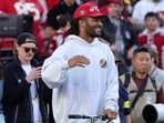 San Francisco 49ers middle linebacker Fred Warner watches the team's warm-up San Francisco 49ers middle linebacker Fred Warner watches the team's warm-up