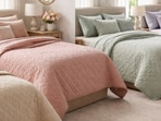 Soft quilted bed covers in calming colours add warmth, texture, and style, creating a snug winter bed setup at home.(AI generated)
