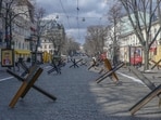 (FILES) This file photo taken on March 13, 2022, shows anti-tank obstacles laid out along a street in the southern Ukrainian city of Odessa. - The UN cultural agency on January 25, 2023, added the historic centre of Ukraine's port city of Odessa to its World Heritage List despite opposition from Russia. (Photo by BULENT KILIC / AFP)