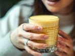 Plant milk with turmeric and warm water helps reduce systemic inflammation, shares Nicole. 