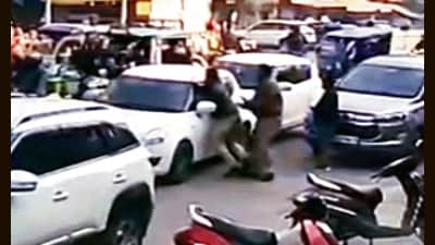 A video grab shows police trying to apprehend the gang’s vehicle at Dandi Swami Chowk in Ludhiana; (right) a damaged car that was hit by the suspect’s vehicle. (HT Photo) A video grab shows police trying to apprehend the gang’s vehicle at Dandi Swami Chowk in Ludhiana; (right) a damaged car that was hit by the suspect’s vehicle. (HT Photo)