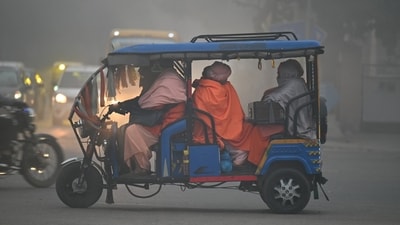 A group of saints wrapped in blankets travel in an e-rickshaw on a cold and foggy Monday morning at Sector-4/7 Chowk near Dreamz Mall in Gurugram. (Parveen Kumar/Hindustan Times) A group of saints wrapped in blankets travel in an e-rickshaw on a cold and foggy Monday morning at Sector-4/7 Chowk near Dreamz Mall in Gurugram. (Parveen Kumar/Hindustan Times)