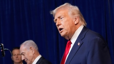 Speaking beside Israeli Prime Minister Benjamin Netanyahu following a meeting at his Mar-a-Lago estate in Florida, Trump suggested Tehran may be working to restore its weapons programs after a massive U.S. strike in June. (AP)