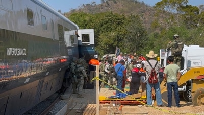 Mexican Army soldiers and Civil Protection members rescued passengers from the Interoceanic train that derailed in the Asuncion Ixtaltepec area on the route to Oaxaca, Mexico on December 28, 2025. (AFP) Mexican Army soldiers and Civil Protection members rescued passengers from the Interoceanic train that derailed in the Asuncion Ixtaltepec area on the route to Oaxaca, Mexico on December 28, 2025. (AFP)