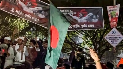 People stage a protest over the death of Sharif Osman Hadi, one of the key leaders in the Bangladesh student uprising, in Dhaka, Bangladesh. (PTI) People stage a protest over the death of Sharif Osman Hadi, one of the key leaders in the Bangladesh student uprising, in Dhaka, Bangladesh. (PTI)