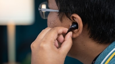 Wireless earphones emit significantly less radiation as compared to mobile phones. (Unsplash) Wireless earphones emit significantly less radiation as compared to mobile phones. (Unsplash)