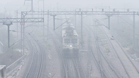 Some of the monitoring stations recorded 400+ AQI on Monday morning include Anand Vihar where trains were barely visible amid fog(Sakib Ali/ Hindustan Times)