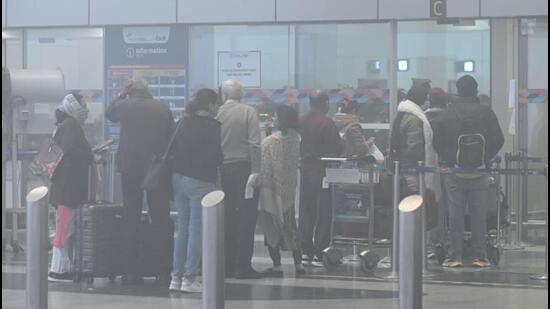 Passengers at T1 terminal of IGI airport on Monday. (Vipin Kumar/ HT Photo)