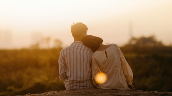 Simply sitting next to each other helps both partners to recharge while staying connected, states Kevin Ashford. (Pexel)
