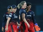 Royal Challengers Bangalore Women's (RCBW) Ellyse Perry and teammates celebrate a dismissal of Mumbai Indians Women (MIW) during their match in the Women's Premier League 2024
