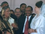 Former Bangladeshi Premiers Sheikh Hasina Wajed (L) and Khaleda Zia (R) speak as they attend a function in Dhaka on November 21, 2008. Former Bangladeshi Premiers Sheikh Hasina Wajed (L) and Khaleda Zia (R) speak as they attend a function in Dhaka on November 21, 2008.