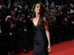 Amal Clooney poses on the red carpet at the 78th Cannes Film Festival. (REUTERS)