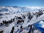 Tourists gather at Afarwat Peak, the upper reaches of Gulmarg, one of the main tourist attractions in Kashmir region.