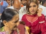 Sreeleela held her grandmother close as they tried to get through the crowd at Tirupati. 